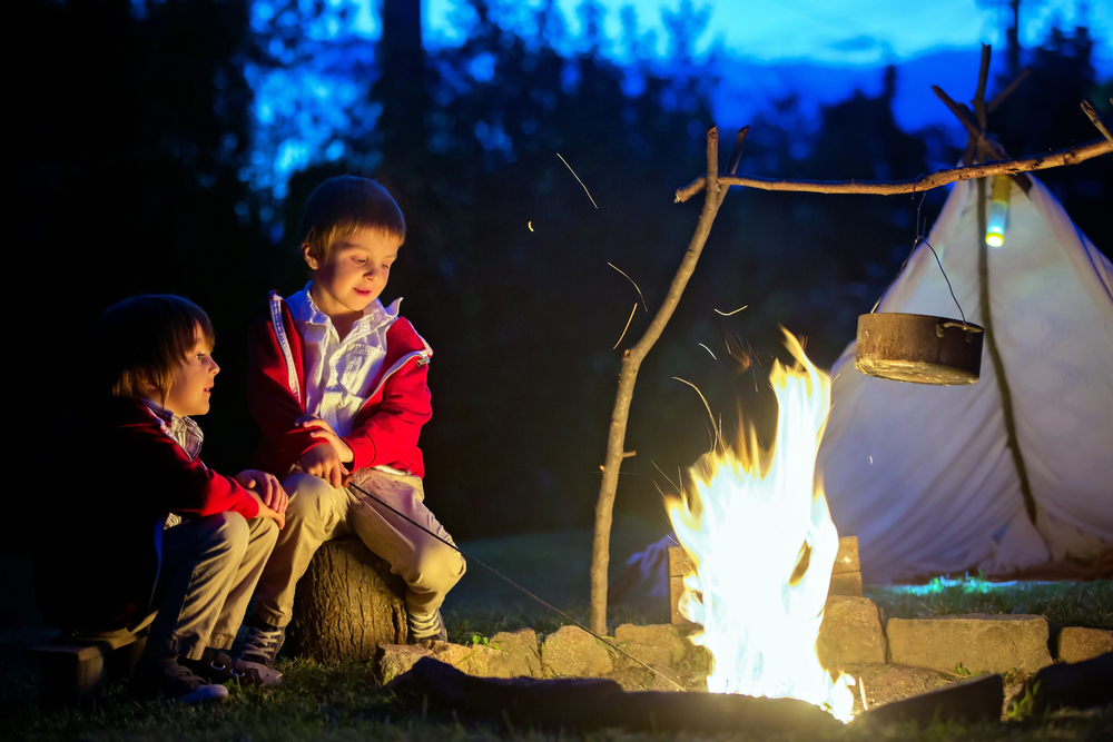 Children next to bonfire